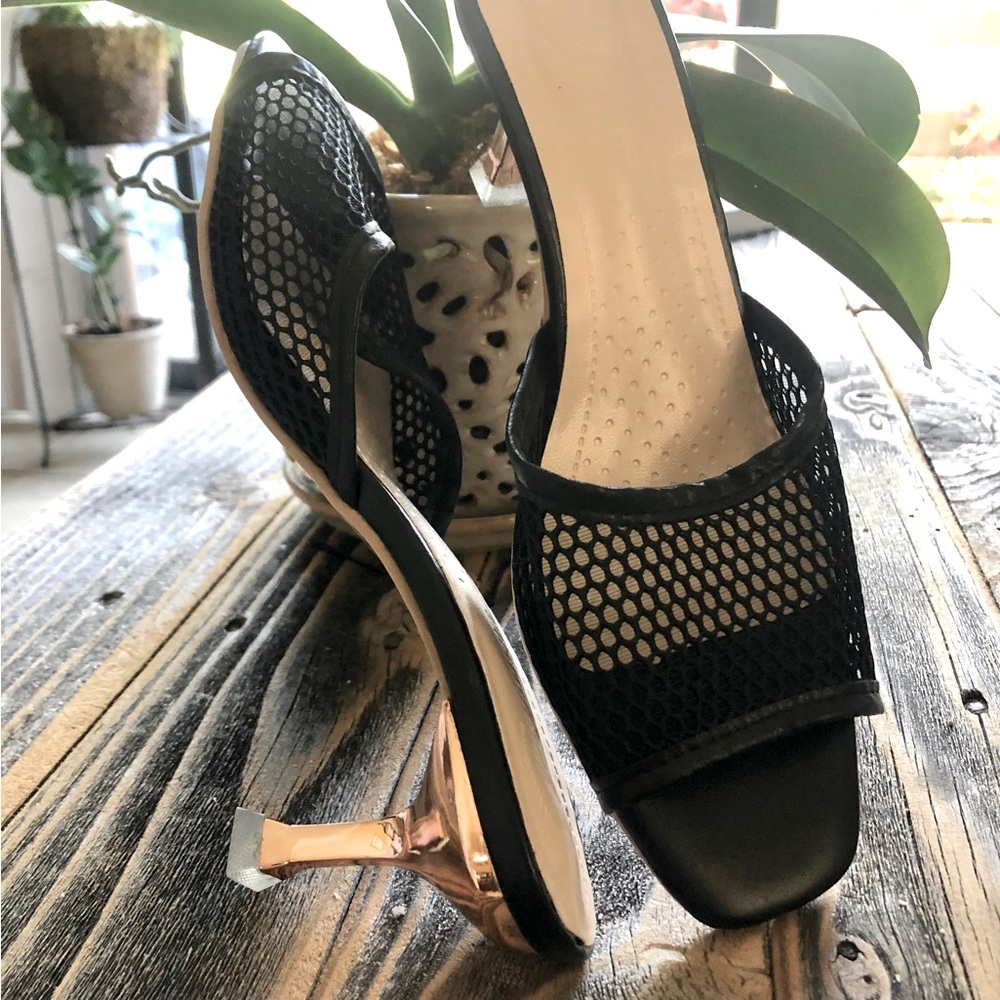 Size 5 Women’s shoes. Mules with mesh overlay and 2” heel.  Never been worn.